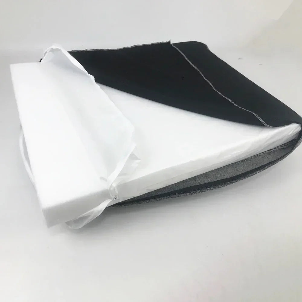 Folded black and white fabric on Dog Mattress