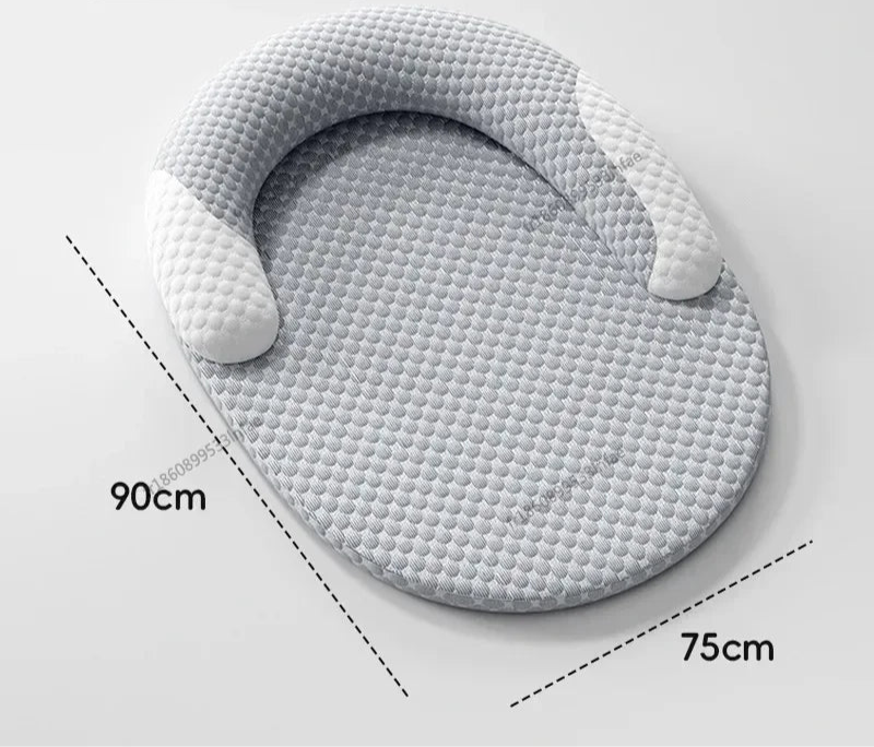 Round gray cooling cushion with textured surface and measurements on a light gray background