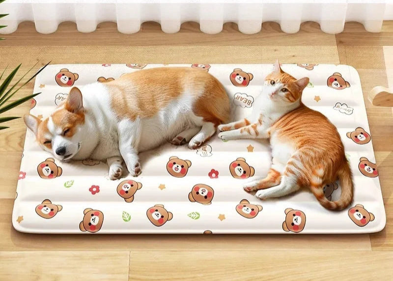 Two dogs lying on a cool and breathable mat with bear patterns.