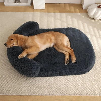 Dog sleeping on a dark gray Orthopedic Dog Bed in a home setting