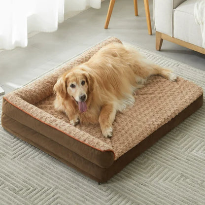 Dog lying on a large brown Orthopedic Mattress in a living room.
