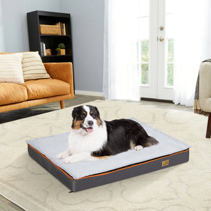 Dog lying on a large Orthopedic Mattress in a living room.